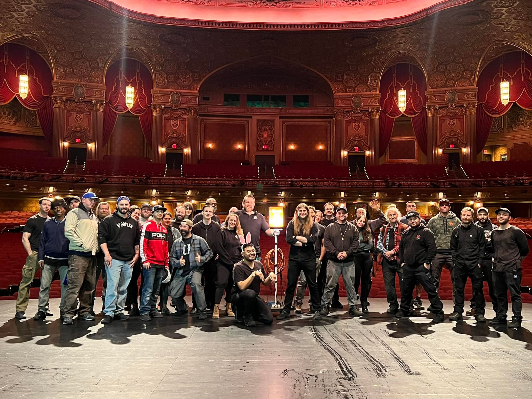 Full crew assembled on stage at Kings Theatre