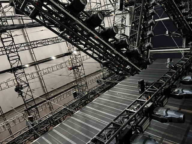 Overhead view of stage rigging at a production venue